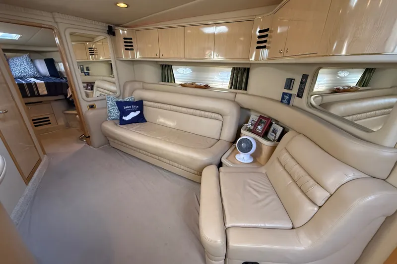 Slide: The Image of Luxurious interior of a 2002 Sea Ray Sundancer 460 yacht with beige leather seating. - 46