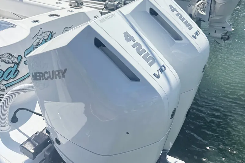 Slide: The Image of Twin Mercury V12 engines on a 2026 Onslow Bay 33 Tournament Edition boat. - 18