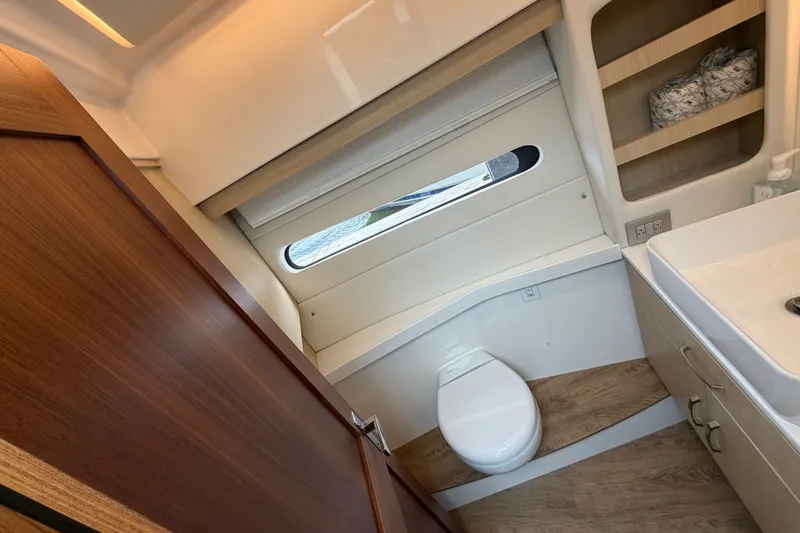 Slide: The Image of Luxurious bathroom interior of 2023 Regal 38 XO yacht with modern fixtures. - 27