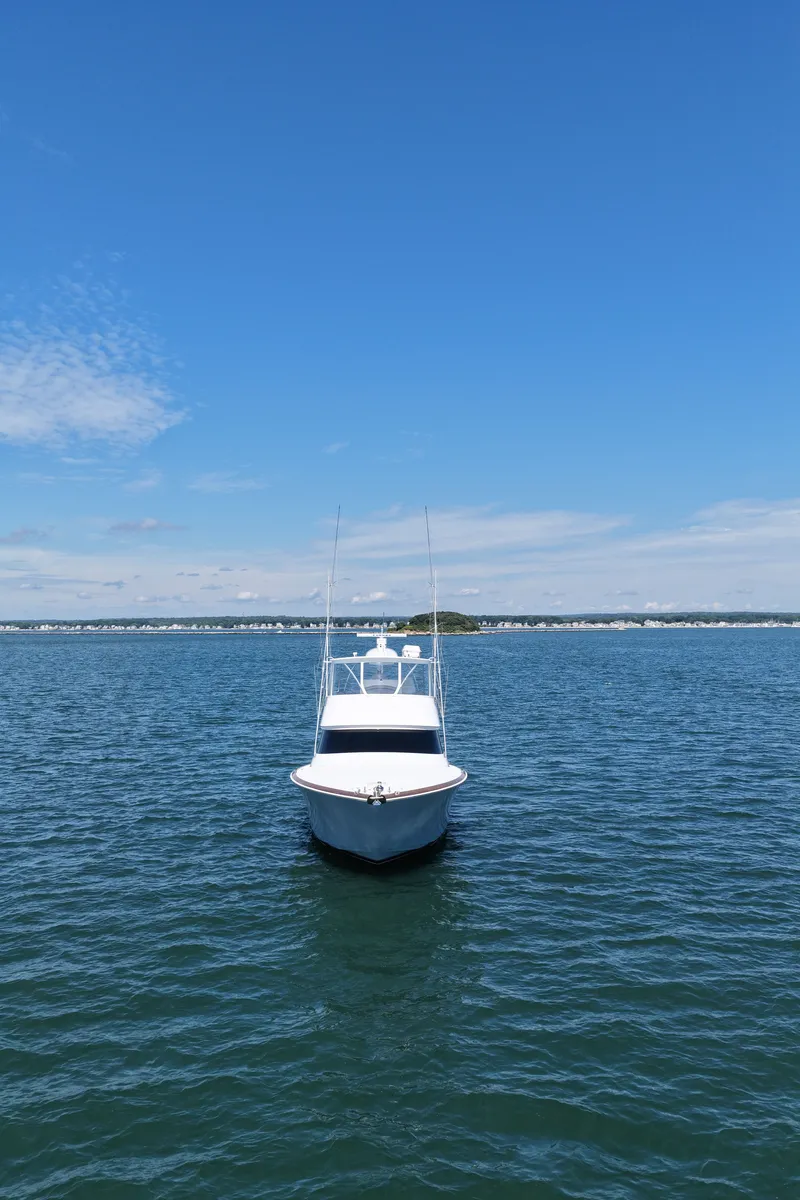 Slide: The Image of Viking 58 Convertible 2027 on calm water with a clear sky. - 5