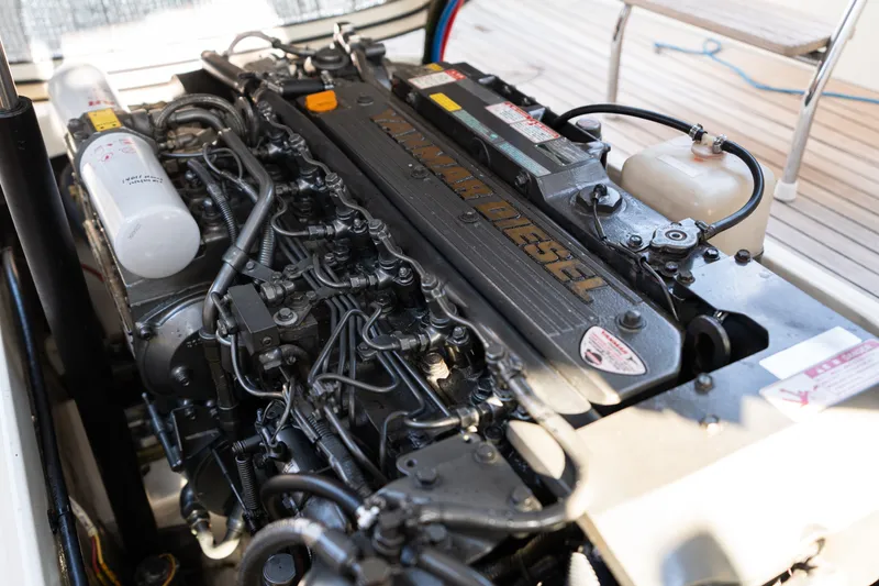 Slide: The Image of Engine of 2006 Hinckley Picnic Boat 36 EP, showcasing detailed mechanical components. - 46