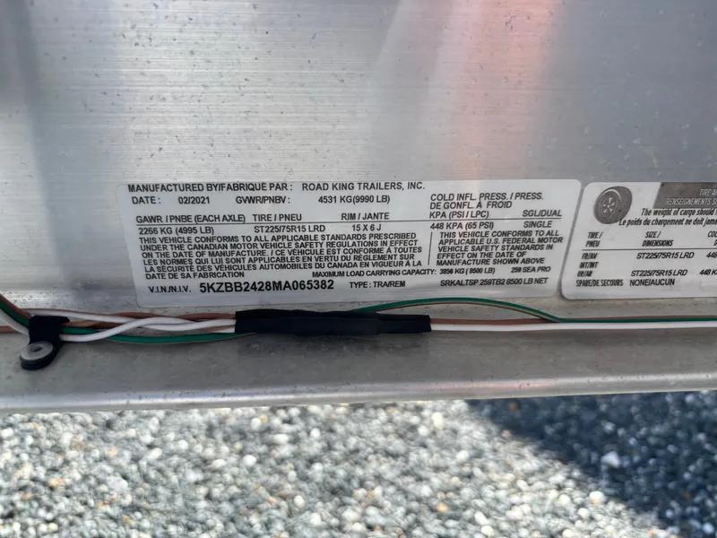 Slide: The Image of A label on a trailer displays technical specifications and manufacturer information. - 18