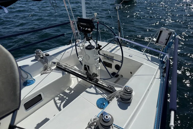 Slide: The Image of Cockpit of a 1994 J Boats J/120 sailboat on the water. - 64