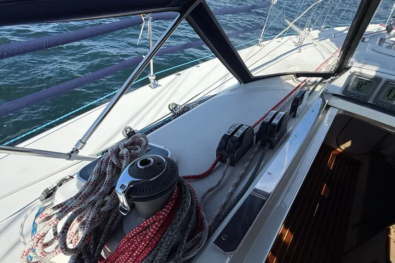 Slide: The Image of Cockpit view of 1994 J Boats J/120 sailboat with ropes and winch. - 55
