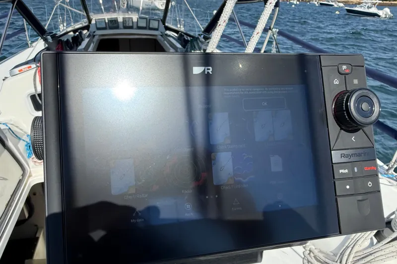 Slide: The Image of Navigation system on a 1994 J Boats J/120 sailboat, with ocean view in background. - 52