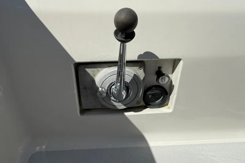 Slide: The Image of Control lever and gauge on a 1994 J Boats J/120 sailboat. - 75