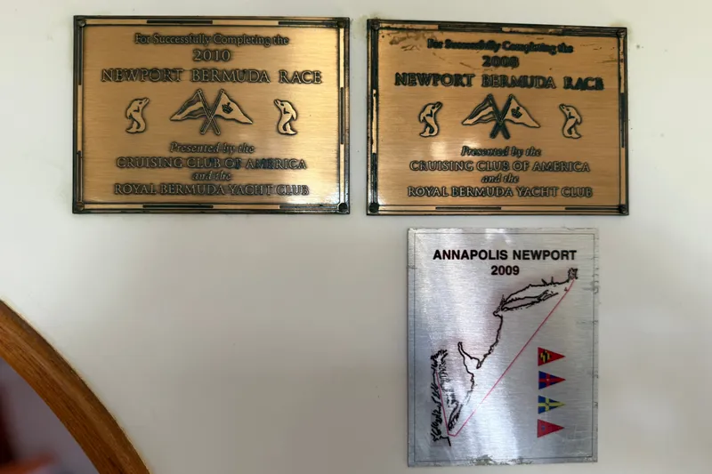 Slide: The Image of Plaques commemorating Newport Bermuda Race 2008, 2010, and Annapolis Newport 2009 on J Boats J/120. - 20