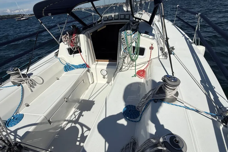 Slide: The Image of Cockpit of 1994 J Boats J/120 sailboat with ropes and winches on deck. - 53