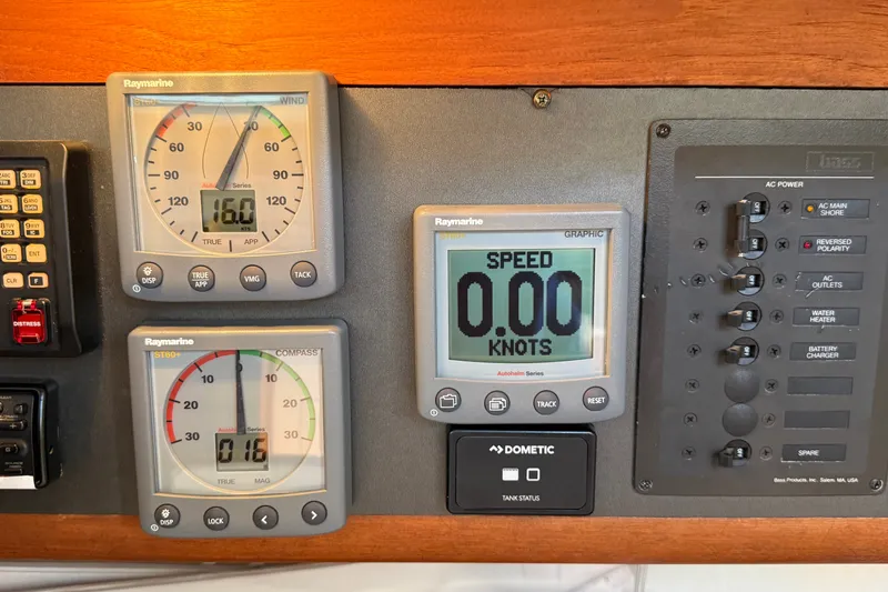 Slide: The Image of Control panel of a 1994 J Boats J/120 sailboat with Raymarine instruments. - 32