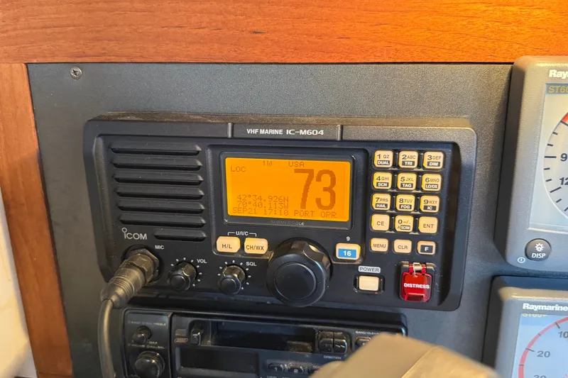 Slide: The Image of VHF marine radio on 1994 J Boats J/120 sailboat, displaying channel 73. - 35
