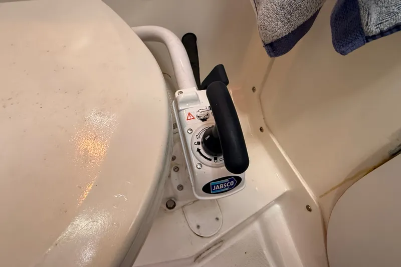 Slide: The Image of Jabsco marine toilet pump handle on a 1994 J Boats J/120 yacht. - 49