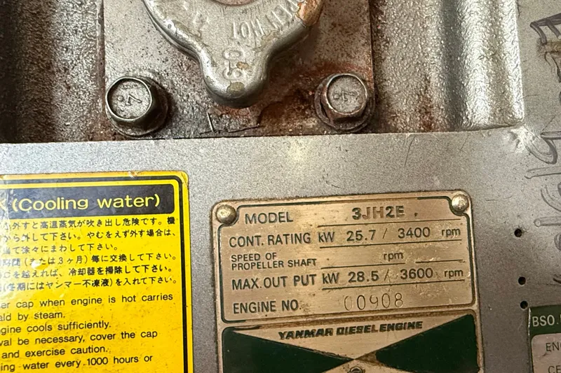 Slide: The Image of Yanmar diesel engine plate on a 1994 J Boats J/120, model 3JH2E. - 81