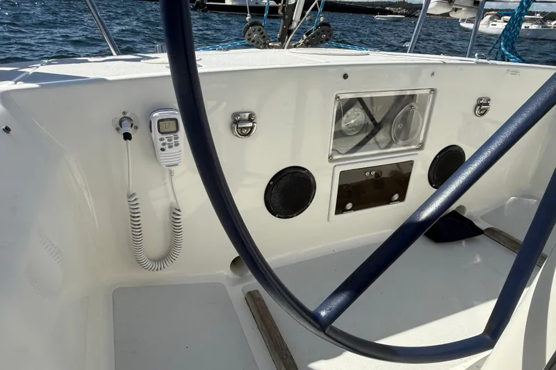 Slide: The Image of Cockpit of 1994 J Boats J/120 sailboat with steering wheel and navigation instruments. - 70