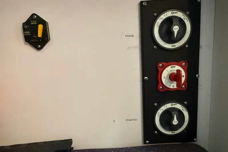 Slide: The Image of Electrical panel with switches on a 1994 J Boats J/120 yacht. - 82