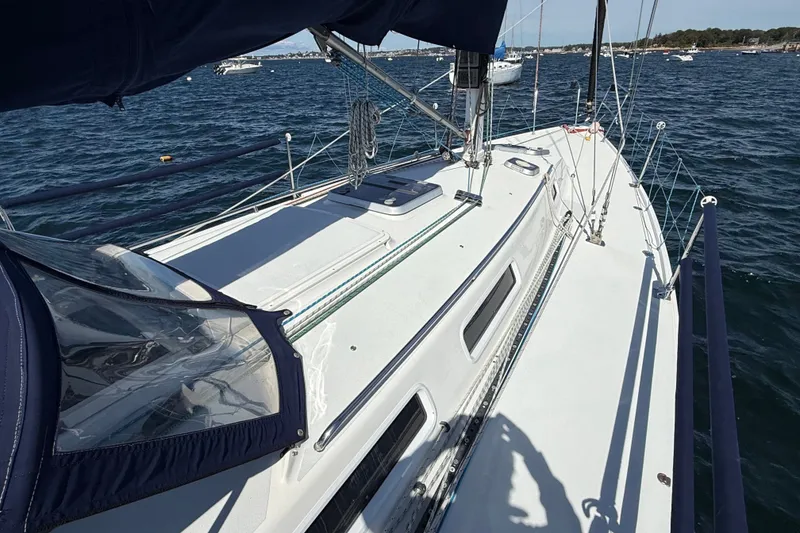 Slide: The Image of Sailing yacht J Boats J/120, 1994 model, on open water with clear skies. - 57