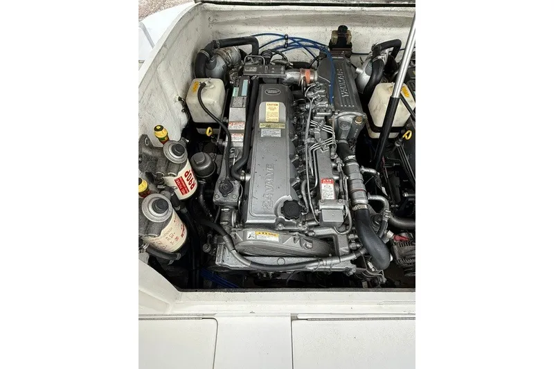 Slide: The Image of Engine compartment of a 2009 Spectre 37, showcasing detailed mechanical components. - 29
