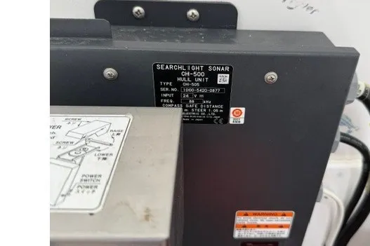 Slide: The Image of Searchlight sonar CH-500 hull unit with specifications label, Spectre 37, 2009 model. - 13