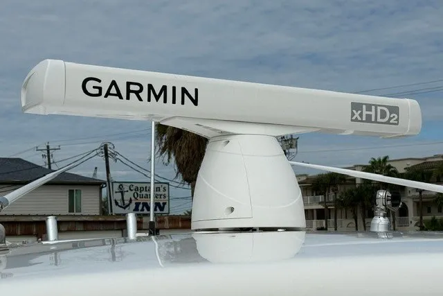 Slide: The Image of Garmin xHD2 radar on 2009 Spectre 37 boat, with Captain's Quarters Inn in background. - 10