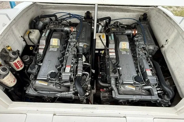 Slide: The Image of Twin Yamaha engines in a 2009 Spectre 37 boat engine compartment. - 30