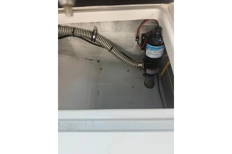 Slide: The Image of Bilge area of a 2009 Spectre 37 boat with pump and wiring. - 25