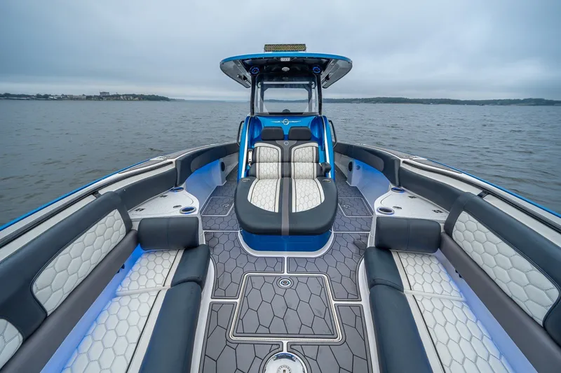 Slide: The Image of 2022 Fountain 39 NX boat interior with luxurious seating on open water. - 26