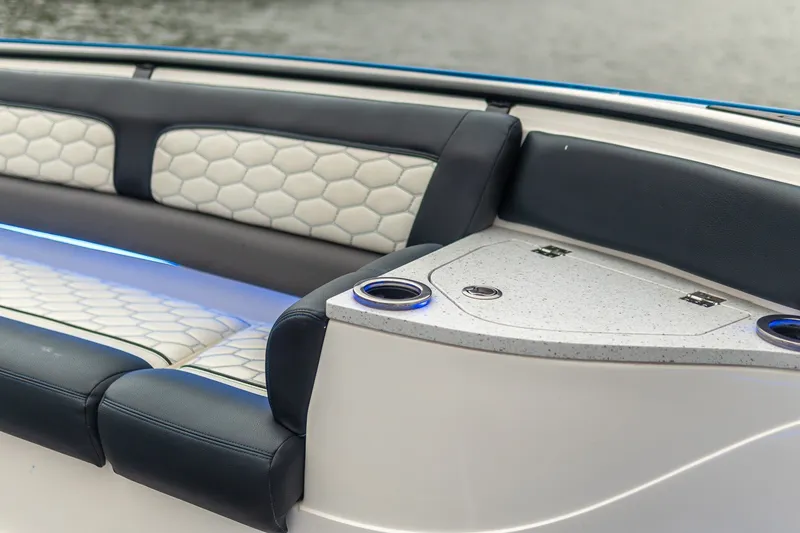 Slide: The Image of Luxurious seating and cup holders on 2022 Fountain 39 NX boat. - 27