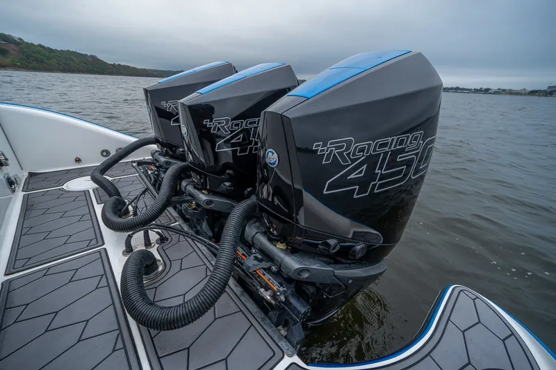 Slide: The Image of Triple Mercury Racing 450 engines on a 2022 Fountain 39 NX boat. - 12