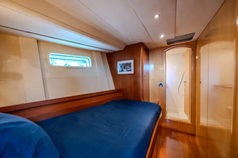 Slide: The Image of Luxurious cabin interior of 2007 CNB 70 yacht with bed and ensuite bathroom. - 58