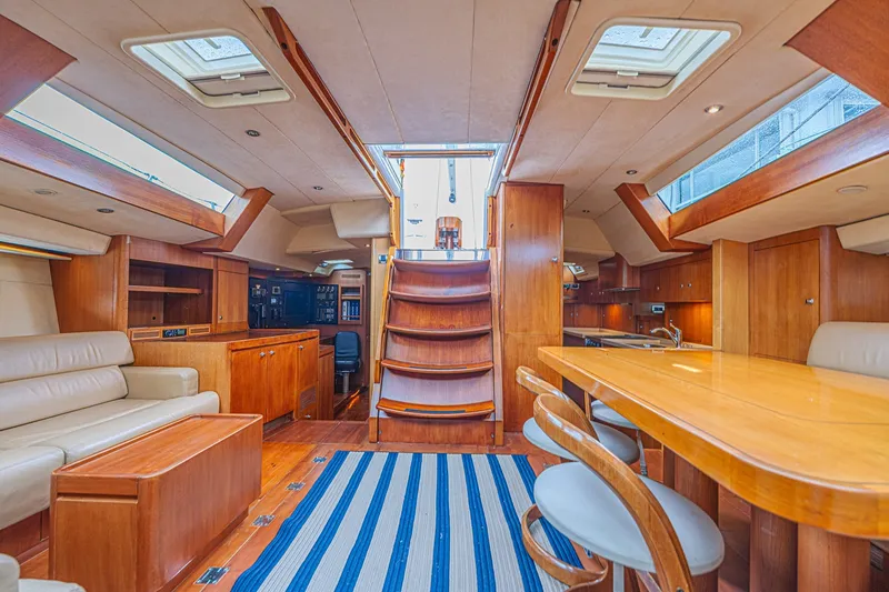 Slide: The Image of Luxurious interior of a 2007 CNB 70 yacht with wooden furnishings and skylights. - 35