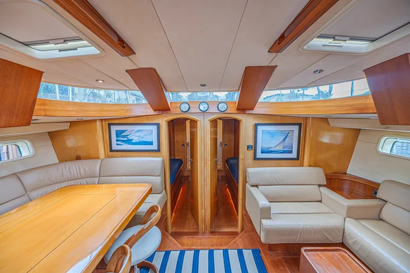 Slide: The Image of Luxurious interior of 2007 CNB 70 yacht with elegant wood finishes and comfortable seating. - 38