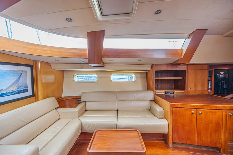 Slide: The Image of Luxurious interior of 2007 CNB 70 yacht with leather seating and wooden cabinetry. - 43