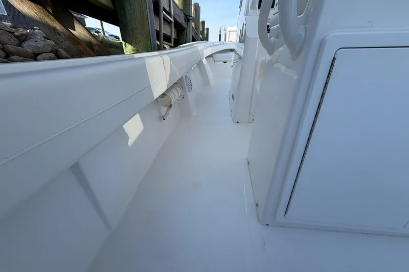 Slide: The Image of 2026 Regulator 28 boat interior, showcasing sleek white deck and side panel design. - 34