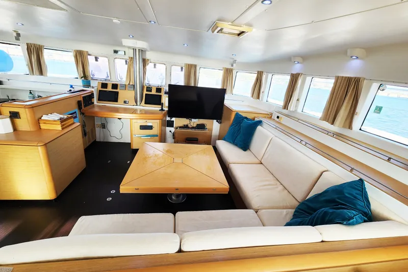 Slide: The Image of Luxurious interior of 2008 Lagoon 500 yacht with spacious seating and modern amenities. - 36