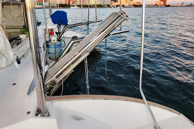 Slide: The Image of Lagoon 500 yacht deck with solar panels and water view, 2008 model. - 25