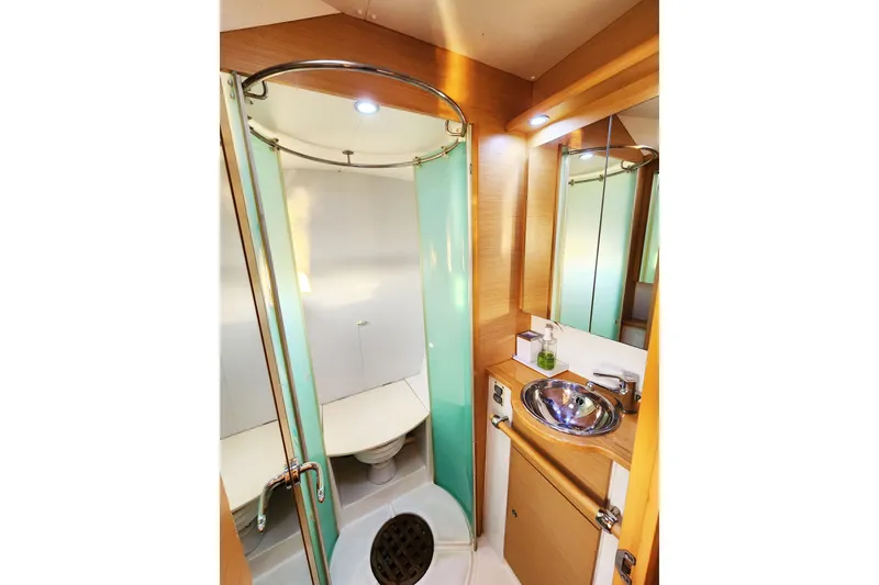 Slide: The Image of Luxurious bathroom in 2008 Lagoon 500 yacht with modern fixtures and elegant design. - 60