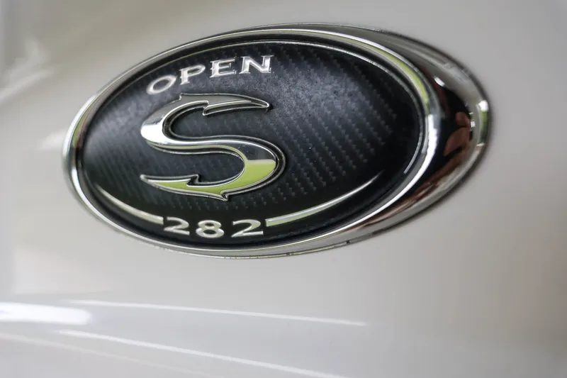 Slide: The Image of 2018 Sportsman Open 282 Center Console emblem on a sleek surface. - 25