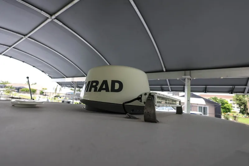 Slide: The Image of Radar equipment on 2018 Sportsman Open 282 Center Console boat under canopy. - 23