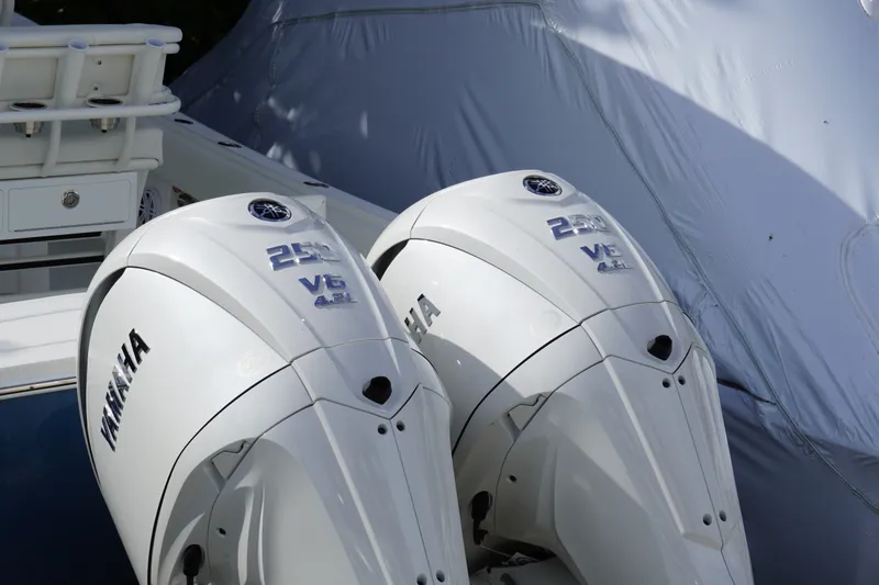 Slide: The Image of Twin Yamaha 250 V6 outboard engines on a 2027 Regulator 25 boat. - 1