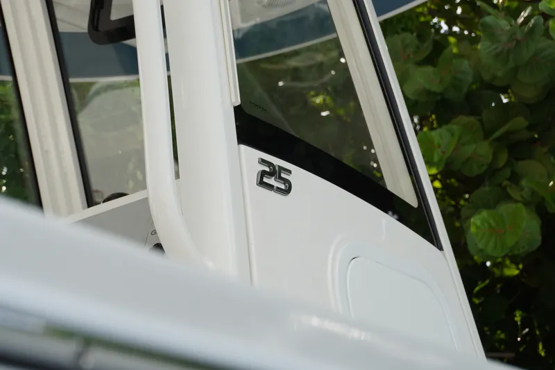 Slide: The Image of 2027 Regulator 25 boat detail with sleek design and modern features. - 2