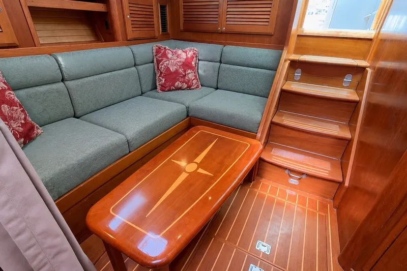 Slide: The Image of Luxurious interior of 2007 Sabre 34 Express yacht with elegant wood finish and cozy seating. - 16