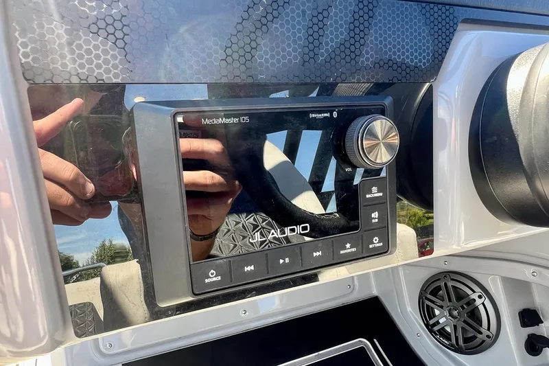 Slide: The Image of Control panel of 2025 Harris Solstice 230 boat featuring JL Audio MediaMaster 105. - 36