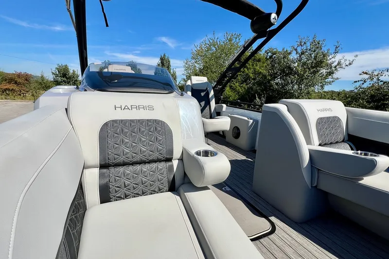 Slide: The Image of 2025 Harris Solstice 230 boat interior with luxurious seating and modern design. - 26