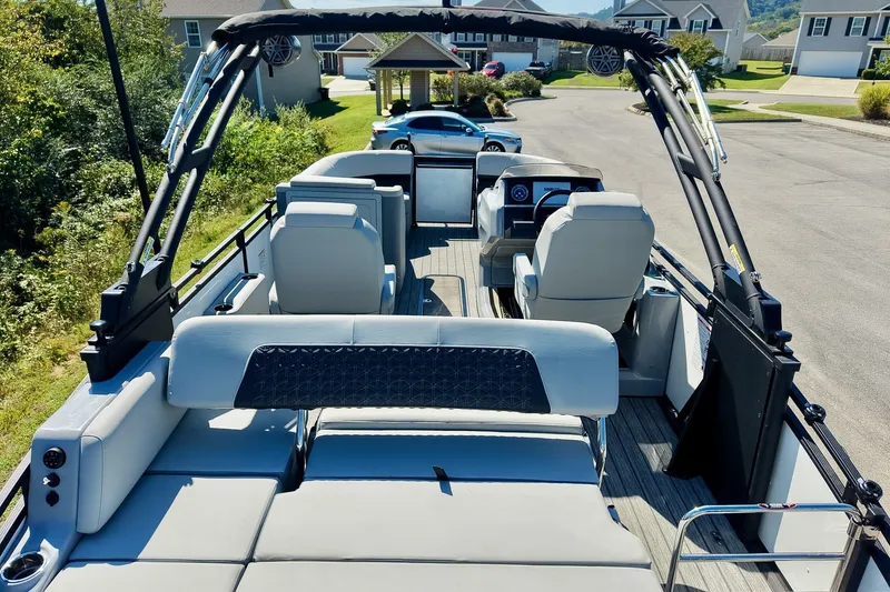 Slide: The Image of 2025 Harris Solstice 230 pontoon boat interior with modern seating and sleek design. - 47