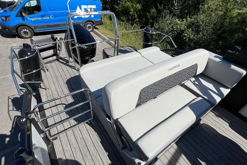 Slide: The Image of 2025 Harris Solstice 230 pontoon boat with sleek seating and modern design. - 46