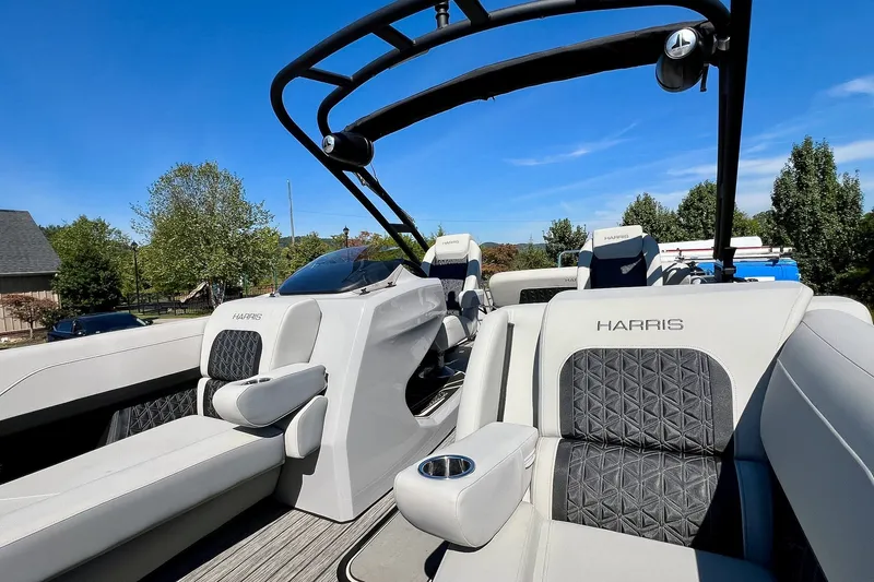 Slide: The Image of 2025 Harris Solstice 230 boat interior with luxurious seating and modern design. - 29