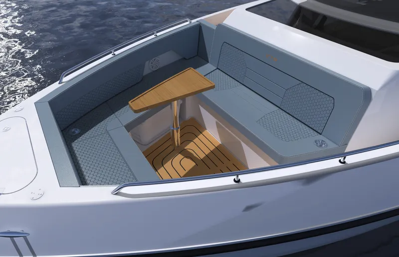 Slide: The Image of The image shows the cockpit of a 2027 Cruisers Yachts 45 VTR with sleek seating and a wooden table. - 17