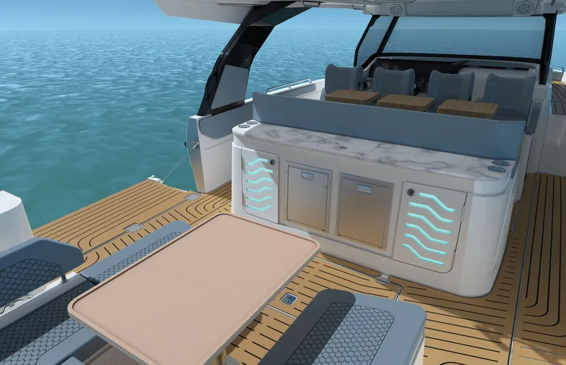 Slide: The Image of The image shows the deck of a 2027 Cruisers Yachts 45 VTR with sleek seating and a table. - 31