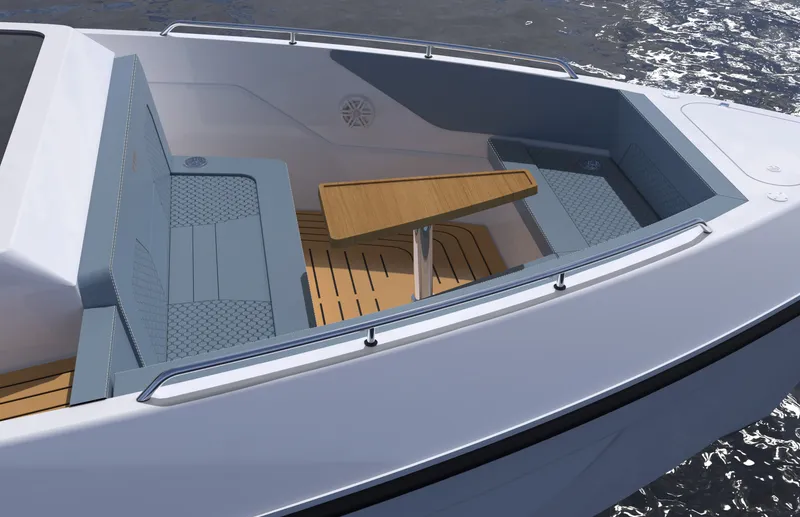 Slide: The Image of The image shows the cockpit of a 2027 Cruisers Yachts 45 VTR with blue seating and a wooden table. - 18
