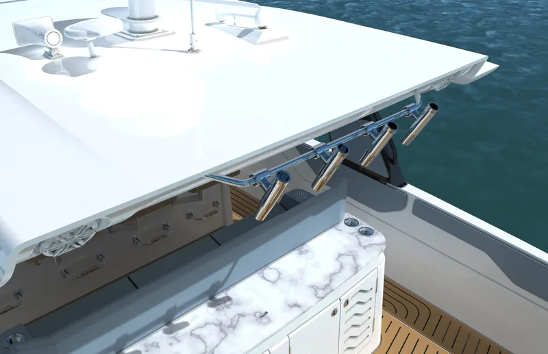 Slide: The Image of The 2027 Cruisers Yachts 45 VTR features a modern outdoor kitchen with a marble countertop and rod holders. - 27