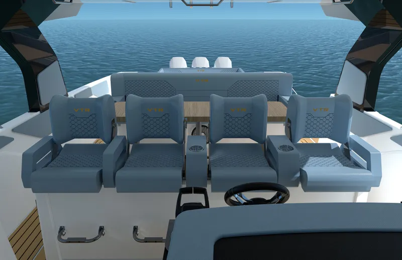 Slide: The Image of The image shows the seating area of a 2027 Cruisers Yachts 45 VTR with blue upholstery. - 22